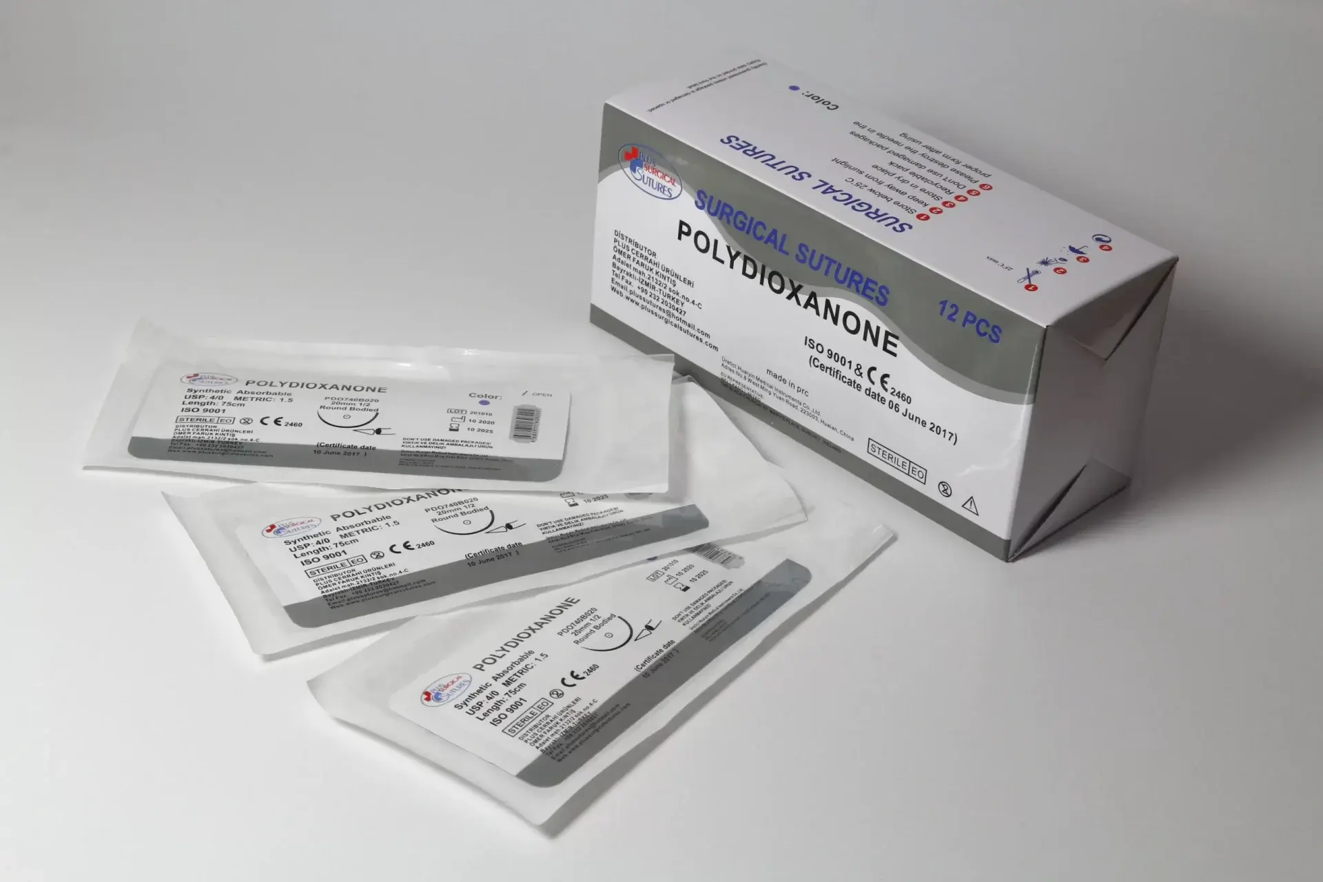 Cerrahi iplik steril paketleri ve kutusu